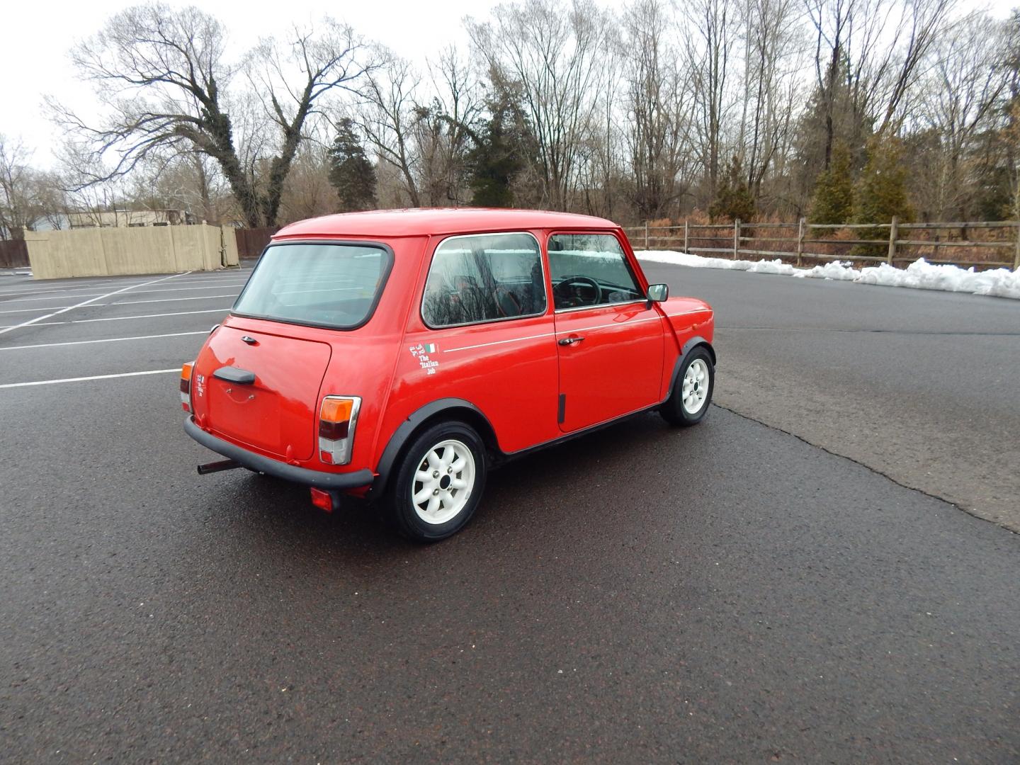 1981 RED /Black Cloth Austin Mini Cooper (AA25AU11248) with an 1275 CC engine, 4 speed manual transmission, located at 6528 Lower York Road, New Hope, PA, 18938, (215) 862-9555, 40.358707, -74.977882 - Very cool, great driving 1981 Austin Mini-Cooper. We believe it is a 1981 due to the rear taillights. The title shows it as a 1969 model year, however the cars built in the 1960s had outside door hinges. Also , the windows were sliding instead of the roll up windows this vehicle has.. Red/ whit - Photo#4